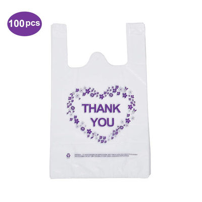 Les poignées claires en plastique de haute qualité de gilet met en sac des sacs à provisions de T-shirt avec le logo fait sur commande