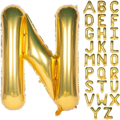 L'hélium d'or déjouent des ballons de lettre d'alphabet de Mylar pour épouser la décoration de fête d'anniversaire