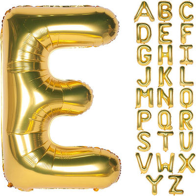 L'hélium d'or déjouent des ballons de lettre d'alphabet de Mylar pour épouser la décoration de fête d'anniversaire